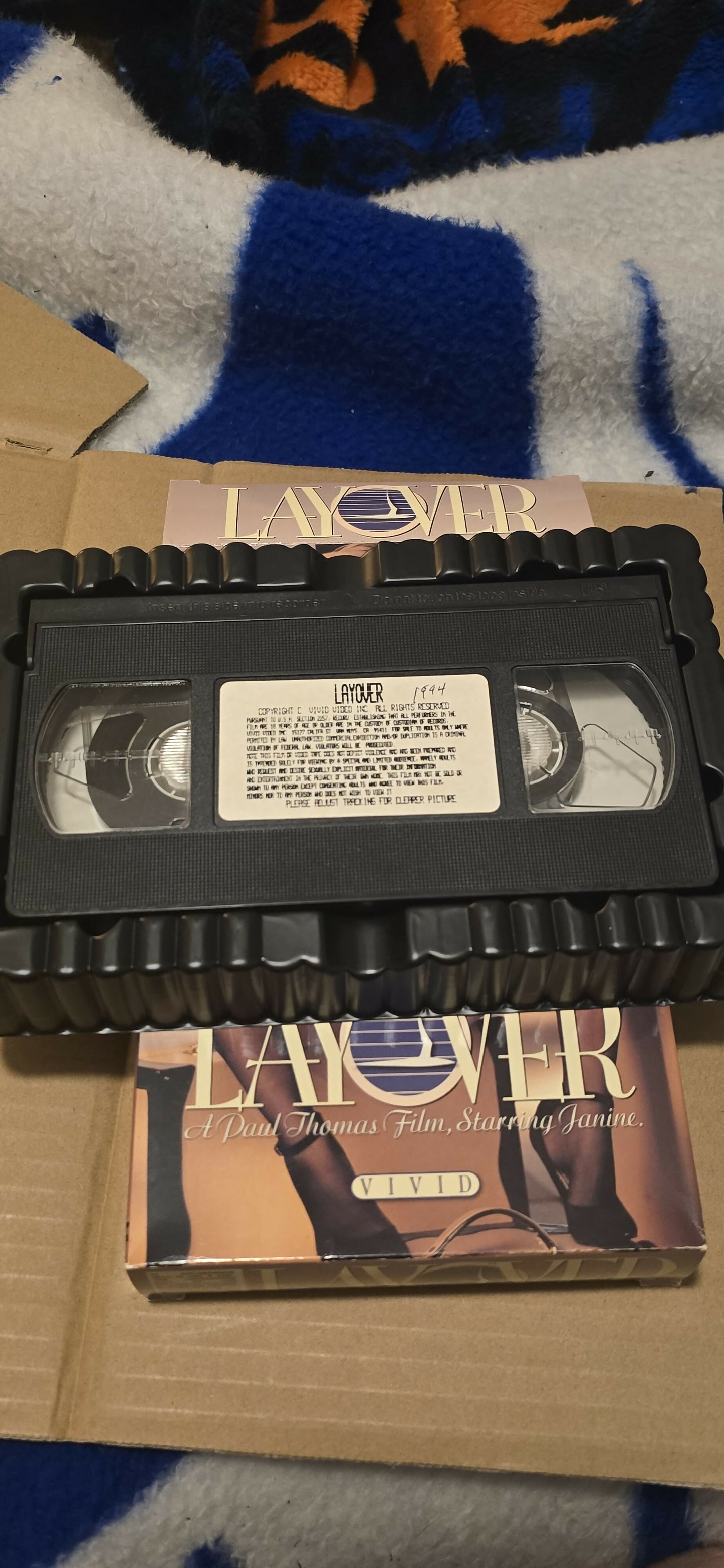 Layover (VHS) - A Paul Thomas Film Starring Janine Lindemulder - Vivid Video (1995) - "It's More Than A Film. It's A Departure."