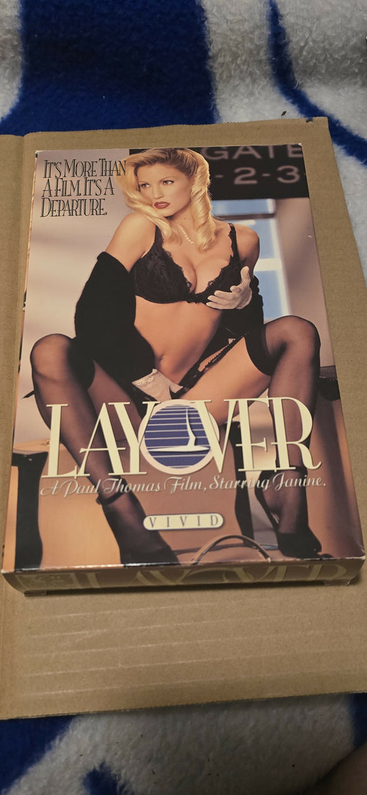 Layover (VHS) - A Paul Thomas Film Starring Janine Lindemulder - Vivid Video (1995) - "It's More Than A Film. It's A Departure."